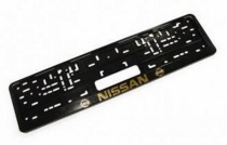 Рамка номерного знака с защелкой черная/золото NISSAN рельеф Рамка номерного знака с защелкой черная/золото NISSAN рельеф